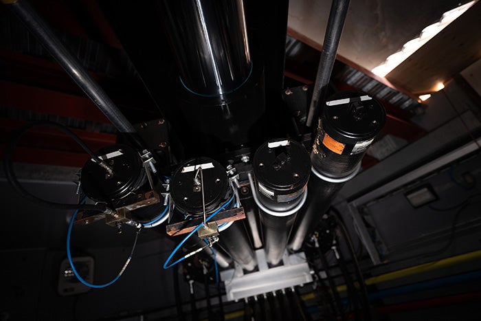 a view of the machinery that moves the shake table