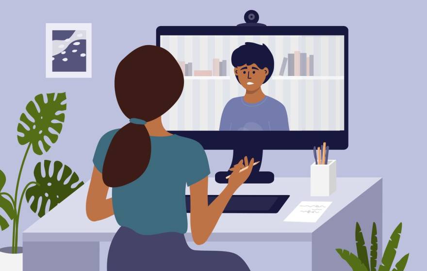 Illustration of a therapist talking with a patient via computer video conferencing.